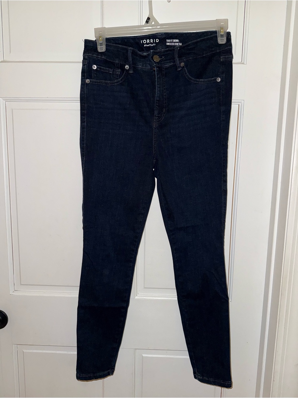 Torrid Trio Fit Skinny Limitless Stretch jeans.